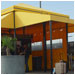 This colorful kiosk provides shelter for customers of Hertz at the Oakland Airport.