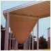 This walkway canopy sculpts an exterior embellishment while protecting walkers from rain and sun in San Jose, CA.
